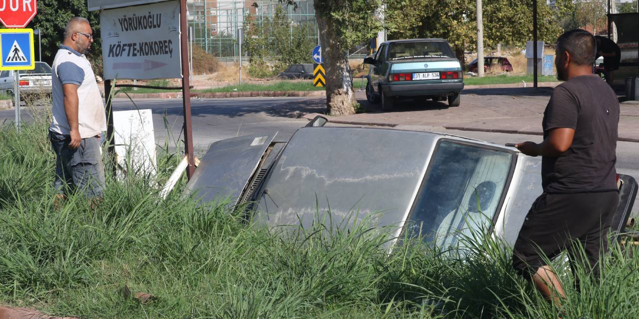 Kanala uçan otomobilden burunları kanamadan çıktılar