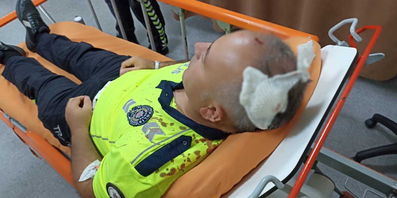 Ehliyetsiz motosiklet kullanan 15 yaşındaki çocuğa cezai işlem uygulayan polise sandalyeli saldırı