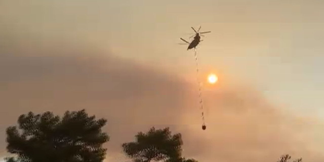 Muğla'nın iki ilçesinde çıkan yangınlara müdahale devam ediyor