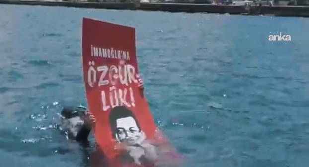 Adalar Belediye Başkanı Akpolat’tan denizin altında “İmamoğlu’na Özgürlük” eylemi