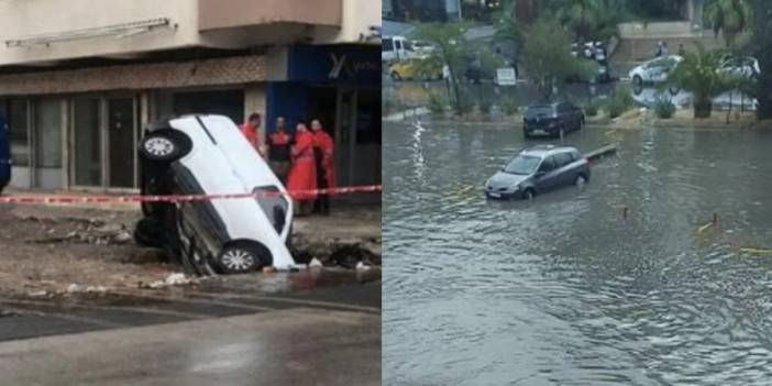 İzmir’de sağanak yağış: Yol çöktü, araçlar çukura düştü, denize sürüklendi