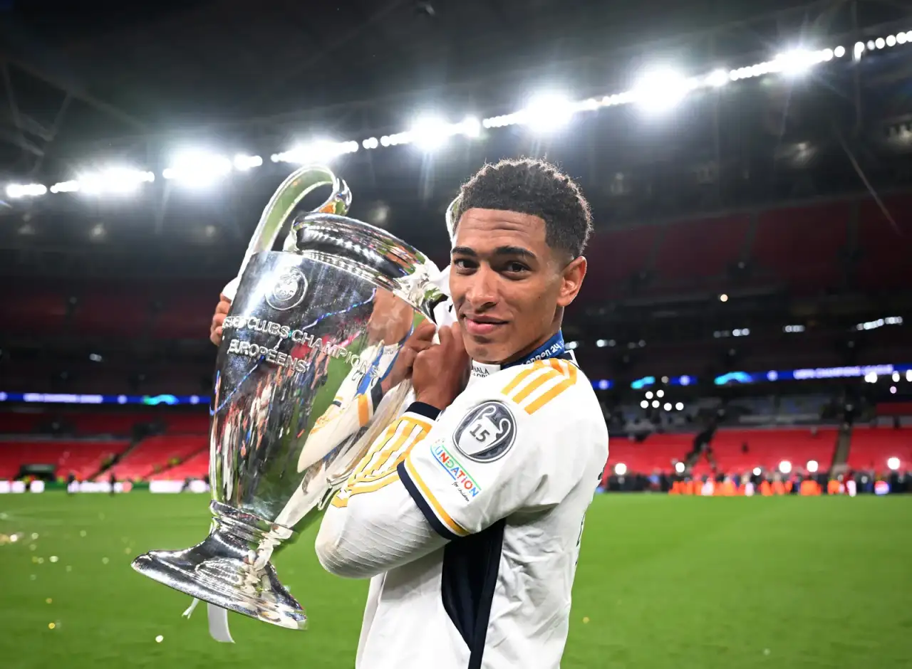 jude-bellingham-with-uefa-champions-league-trophy-after-win-june-2024